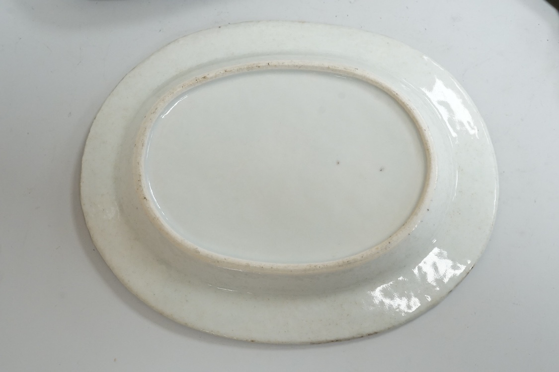A Chinese embroidered spectacles case and an armorial oval miniature dish